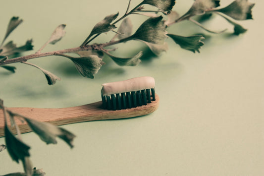 pink and brown brush on white surface