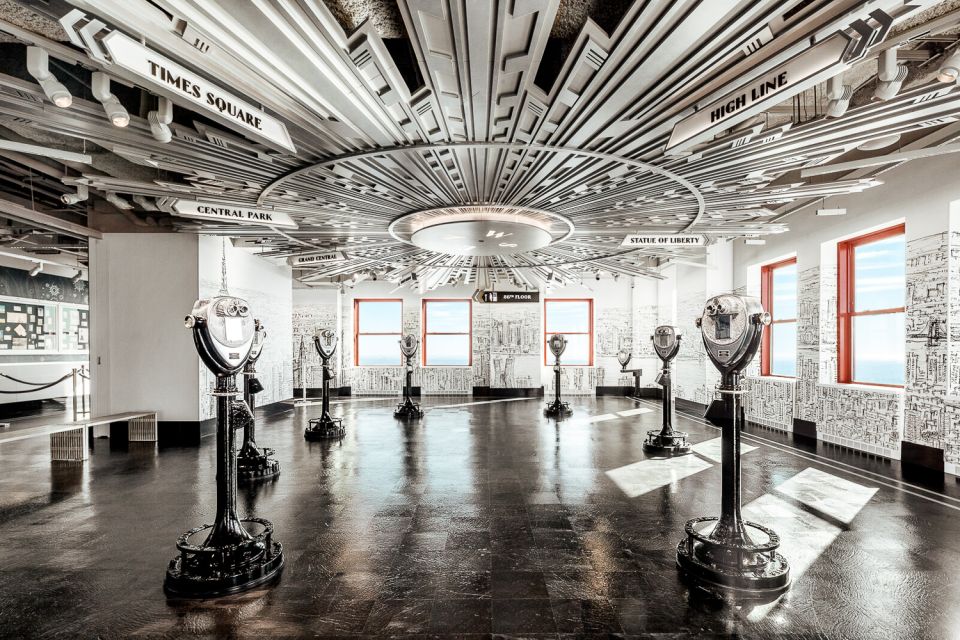 a group of people standing in a train station