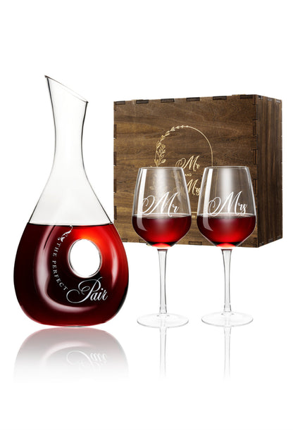 a table with wine glasses and wine glasses 