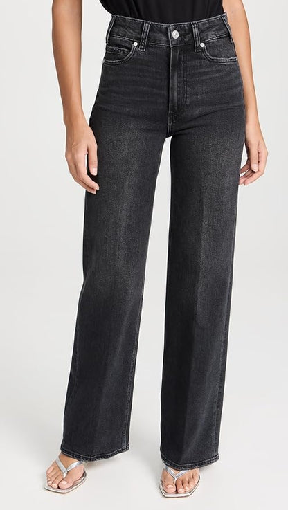 a couple of women standing next to each other 