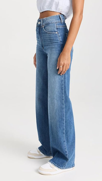 a couple of people standing next to each other 