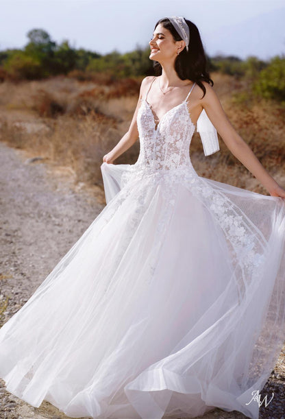 a bride and groom are cutting their wedding cake 