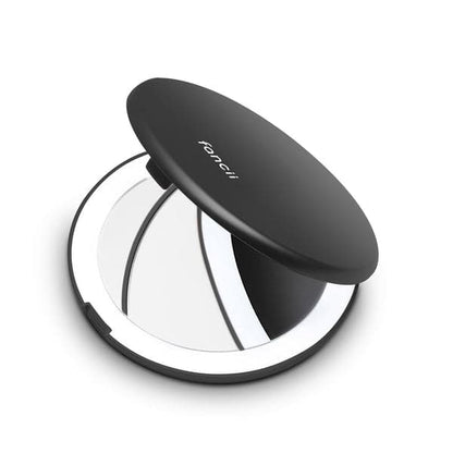 a computer mouse sitting on top of a toilet 
