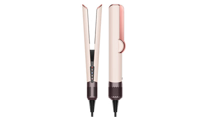 a pair of scissors on a white surface 