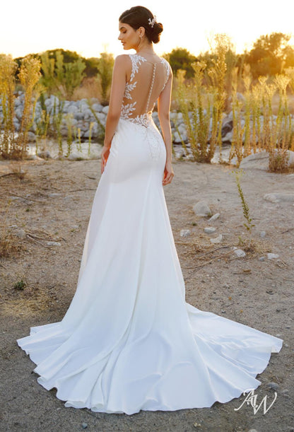a bride and groom are holding an umbrella 