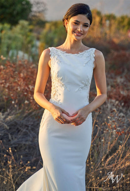 a woman in a white dress holding a baseball bat 