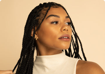 a woman in a dress and a tie 