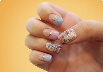 a close up of a person holding a cell phone 