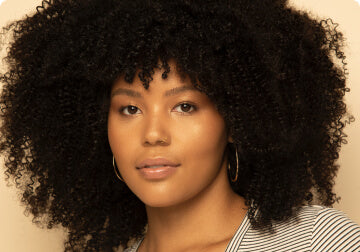 a woman in a dress and a tie 