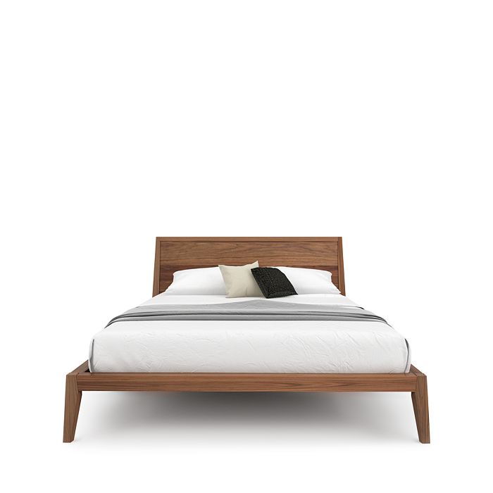 a picture of a small bed on a bed 