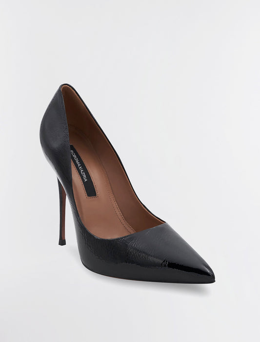 a pair of shoes on a white surface 